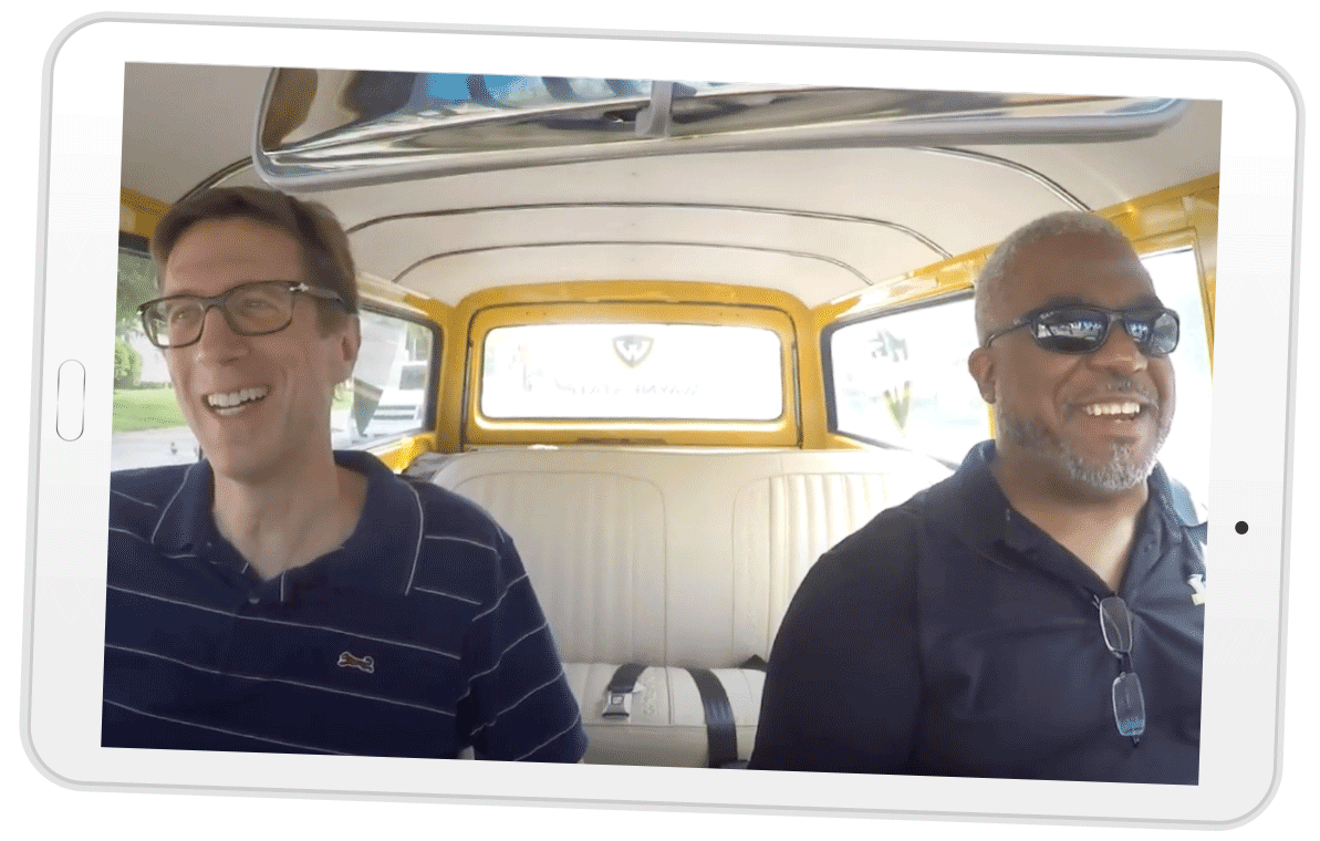 Dean Richard A. Bierschbach and Keith E. Whitfield in Keith's car on a driving tour