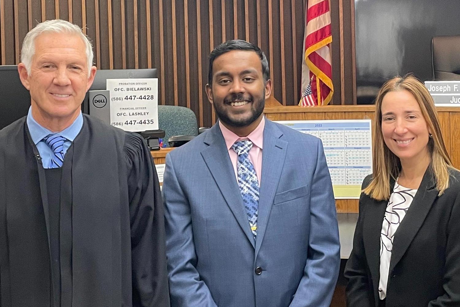 Muthu Veerappan photographed smiling with Judge Joseph F. Boedecker and Macomb County Assistant Prosecuting Attorney Jacqueline Gartin