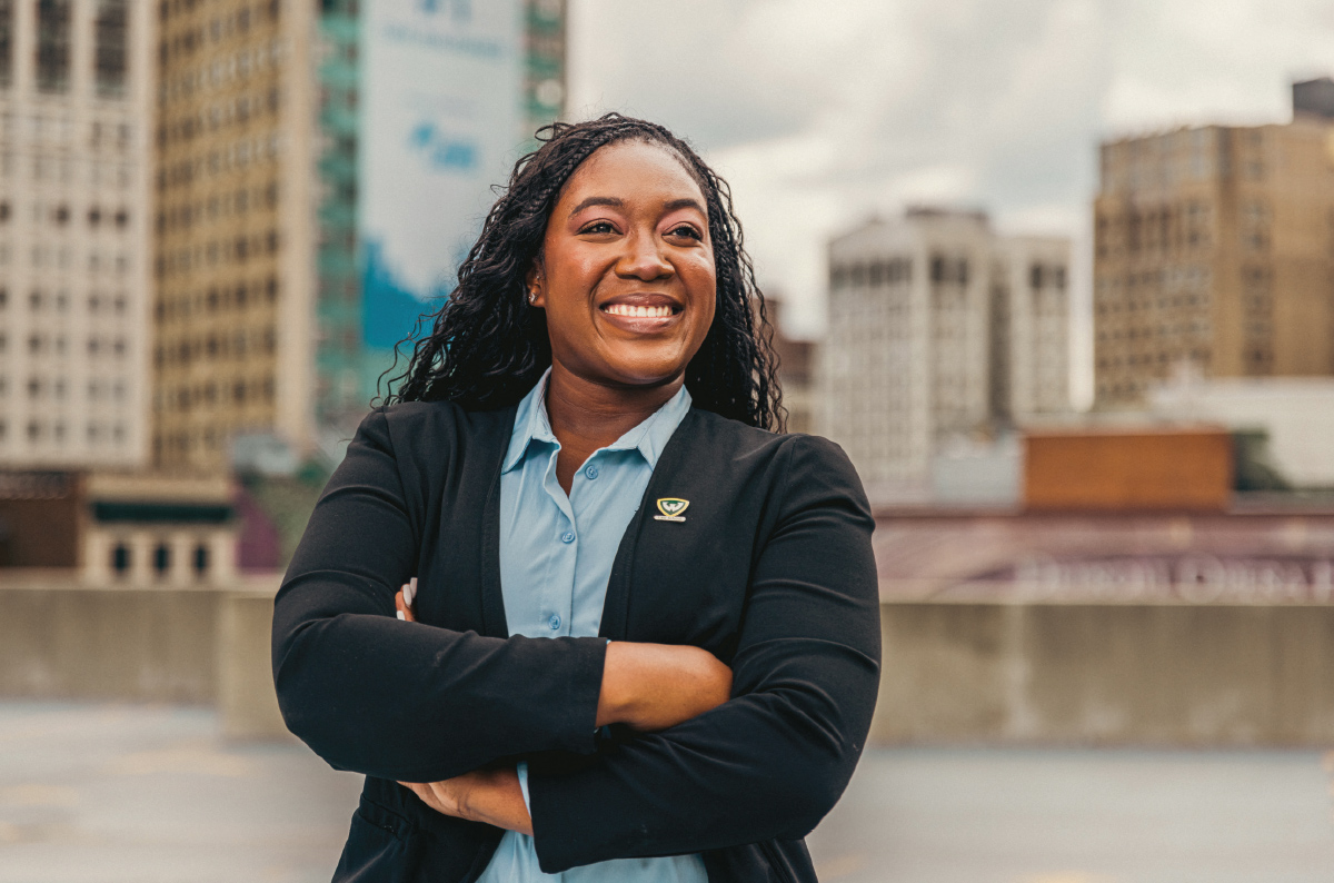 woman wearing blazer with WSU pin 